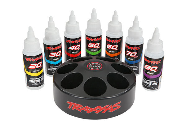 5038X - Shock oil set (includes 20 wt, 30 wt, 40 wt, 50 wt, 60 wt, 70 wt, & 80 wt premium shock oils with spinning carousel rack)
